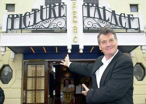 Michael Palin standing in front of the Electric Picture Palace